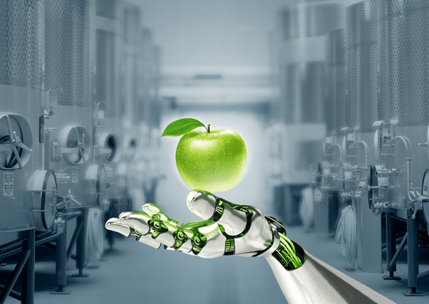 Lobricated robot hand holding apple